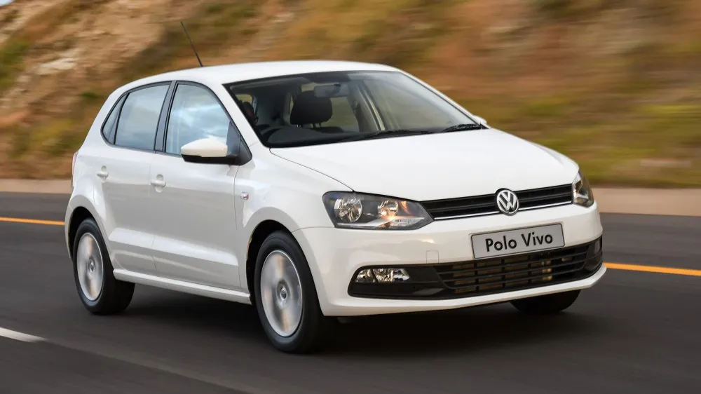 White Volkswagen Polo Vivo travelling on a road.