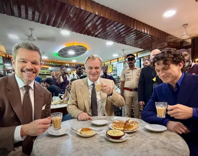 Matt Damon, Christopher Nolan and Tom Holland enjoying a bun maska and chai at Olympia Coffee House.