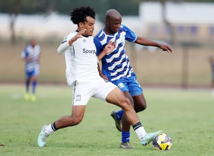 Cayden Fortune of Cape Town City challenges Edmore Chirambadare of Magesi FC during the Betway Premiership 2025/26 Promotion Playoffs match at Seshego Stadium.