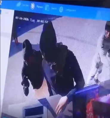 A separate incident showing CCTV footage from outside a Crossroads spaza shop shows armed men on the premises while customers are shopping. 
