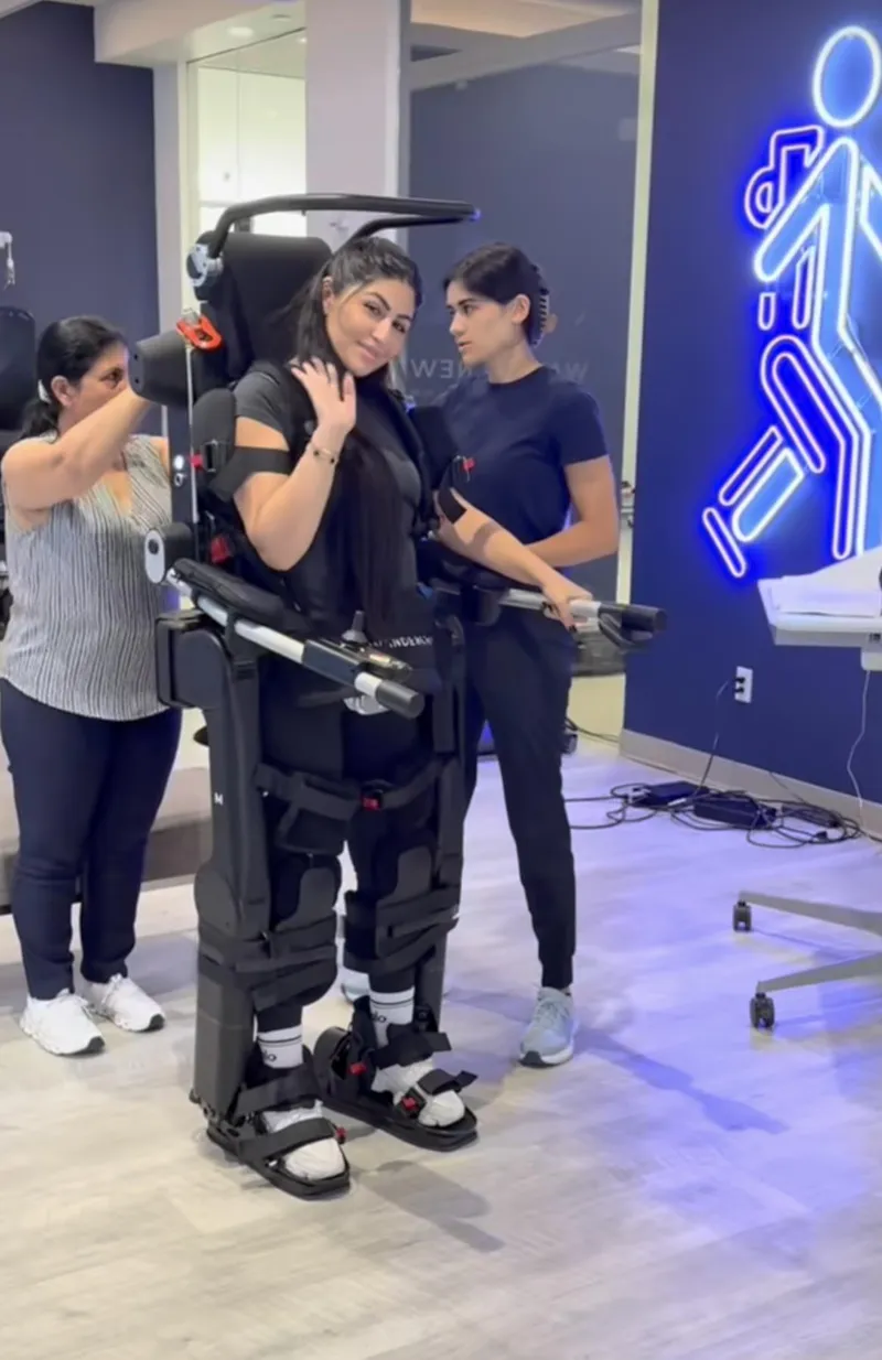 How a robotic exoskeleton enabled a woman to walk again after a decade of paralysis