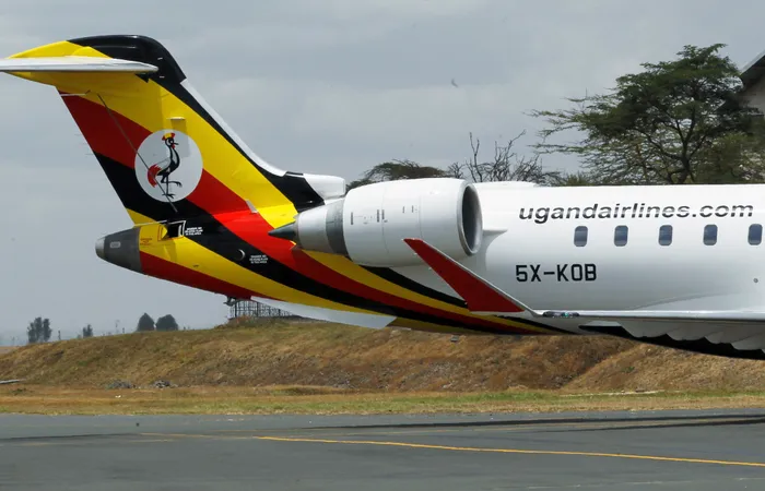 FILE PHOTO: A Uganda Airlines Bombardier CRJ-900 taxi is pictured during its relaunching flight to Jomo Kenyatta International Airport in Nairobi