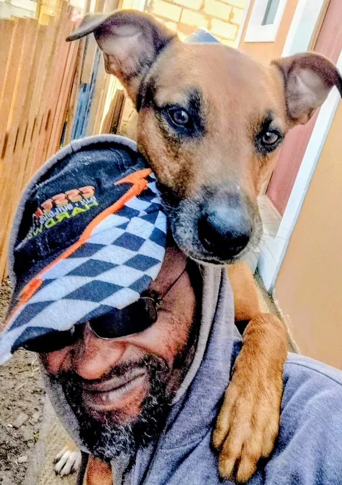 The long journey home for Stephen Black Lion Singhini and his faithful dog, Fireman, has been delayed, but their supporters say every extra day is worth it if it means the pair can finally be reunited in Malawi.