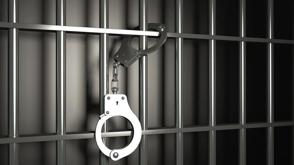 Two suspects arrested for running extortion racket from behind bars