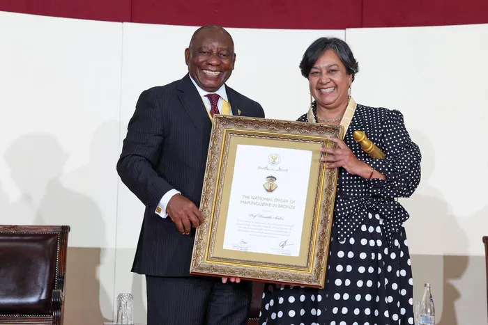 Prof. Priscilla Baker, who received The National Order of Mapungubwe in Bronze form pres. Cyril Ramaphosa for her scientific work.