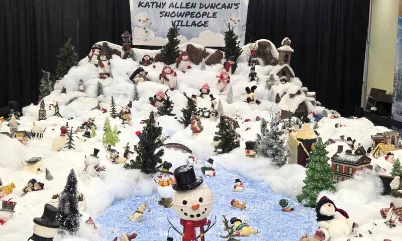In tribute to late wife, husband rebuilds her snowman village
