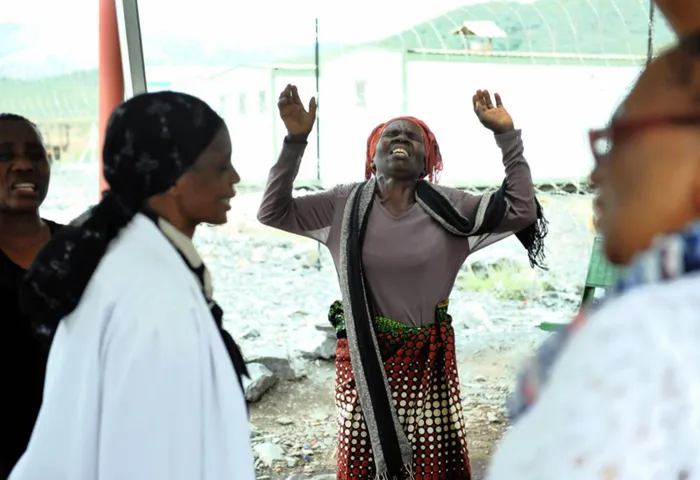 Churches and the community join in prayers at the mine for the three Lily Mine workers who have been trapped underground for eight weeks and counting. Picture: Matthews Baloyi