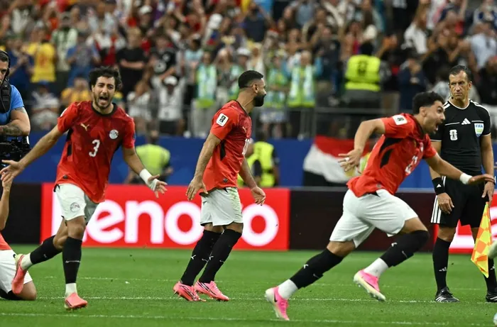 Egypt forward Mohamed Salah, centre, celebrates after winning the 2026 World Cup round of 32 football match against Australia at the Dallas Stadium in Arlington on Friday.