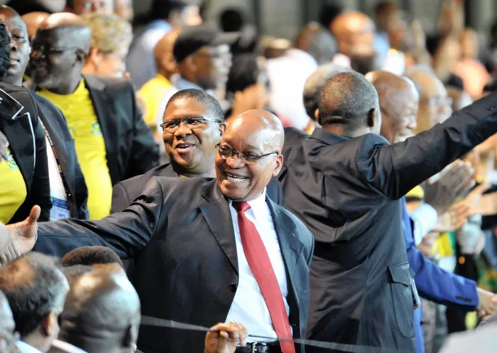 ON THE BALL: President Jacob Zuma is joined by Minister of Sports Fikile Mbalula in celebrating Bafana Bafana's opening goal against Mali on Sunday. The writer says South Africans no longer expect that Zuma will be answerable to accountability.