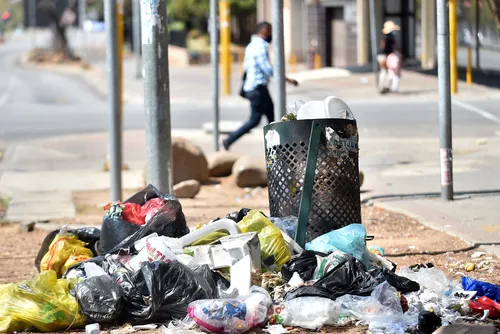 No timeline for refuse collections as depot protests leave city buried in waste