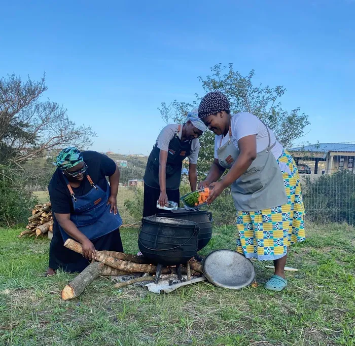 Phumeza Stuurman (black dress), Zintle Magalela (centre) and Azakhiwe Sijila taken at Seya Location, Nxarhuni Village in East London.
