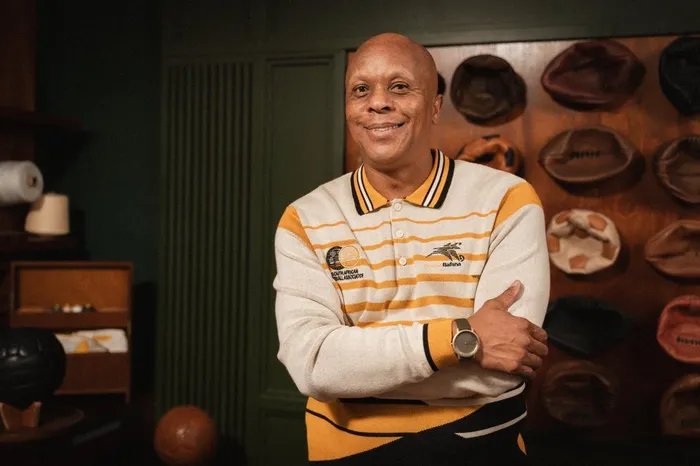 Member of the 1996 Afcon-winning Bafana Bafana, Doctor Khumalo tries out the new legacy kits released by Safa in conjunction with premium leisurewear brand, Old School. Picture: Safa/Old School