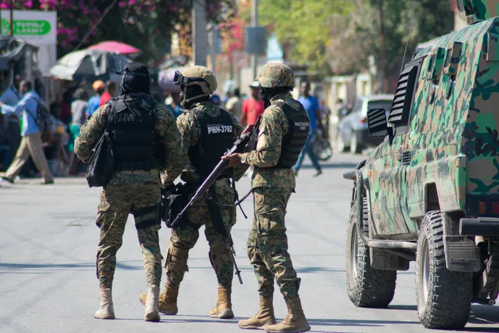 Haitian police officers deploy in Port-au-Prince, Haiti, on March 9, 2024. - Sporadic gunfire rang out in Port-au-Prince late March 8, an AFP correspondent there heard, as residents desperately sought shelter amid the recent explosion of gang violence in the Haitian capital. Picture: Clarens SIFFROY / AFP