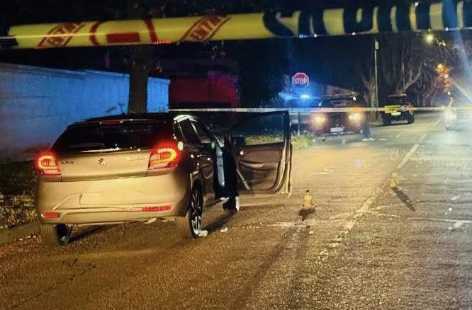Police officers secure the area in Houghton following the shooting of suspended Major-General Feroz Khan.