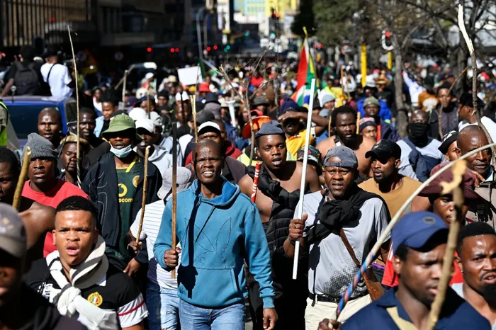 Gauteng police have arrested three suspects after two people, including a 17-year-old, were shot and injured during a protest in Hillbrow on Tuesday.