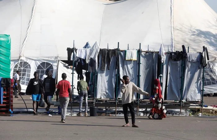 Thousands of Malawian foreign nationals, seeking refuge at the Durban drive-in site on North Beach, are going about their business, doing their laundry, shaving their hair, and selling food and other accessories, while others take advantage of Durban's warm weather, basking in the sun, waiting for their repatriation processes