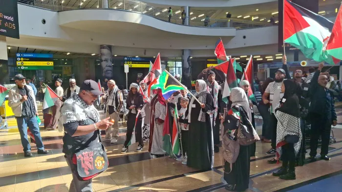 Supporters gathered at O.R. Tambo International Airport to welcome home the brave South African delegates, celebrating their return from the Gaza flotilla mission and standing united in the fight for justice and freedom for Palestine.