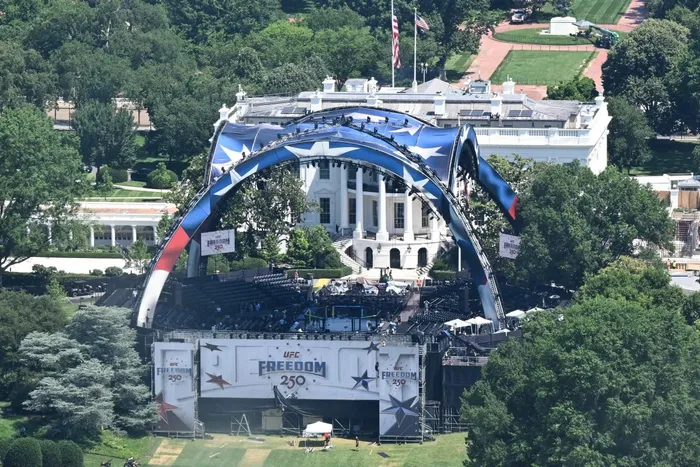The structure, known as "The Claw," for the upcoming UFC fight that US President Donald Trump will host as part of the 250th anniversary of the United States is seen on the South Lawn of the White House.