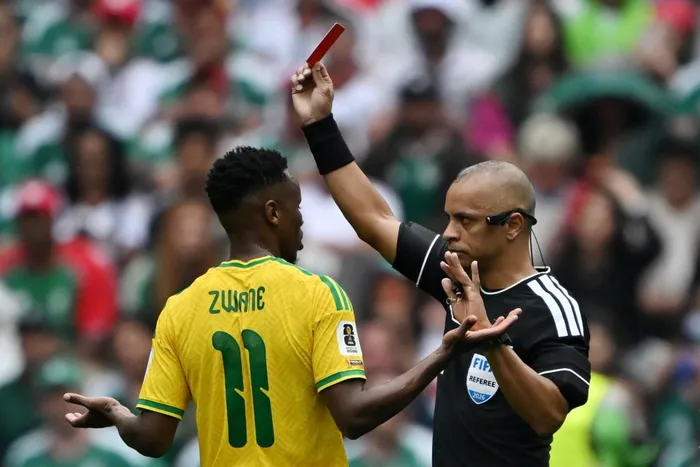 Brazilian referee Wilton Sampaio shows a red card to South Africa's midfielder Themba Zwane during the 2026 World Cup Group A football match between Mexico and South Africa at the Mexico City Stadium in Mexico City on June 11, 2026. Picture: CARL DE SOUZA / AFP