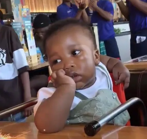 WATCH: Unimpressed baby checks out of his own birthday party