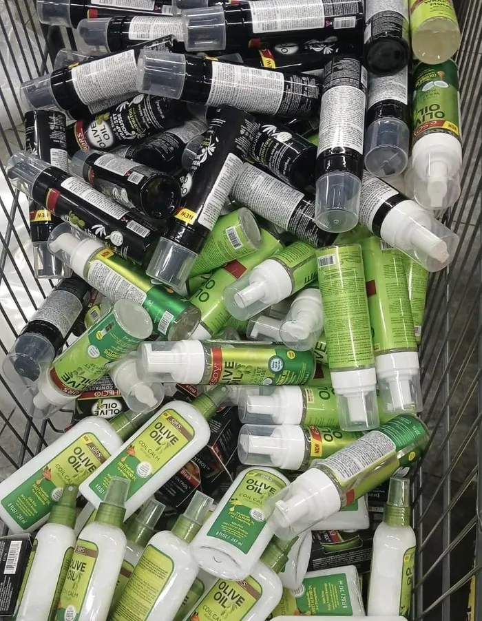 Police confiscated Olive Oil creams and glossing hair products during a crackdown on counterfeit and illicit goods in Middelburg.