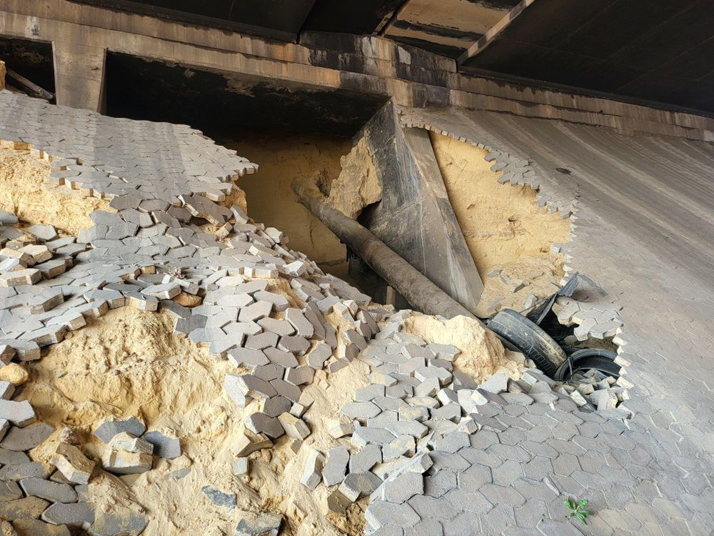 Shocking crater under Joburg highway bridge is just the tip of the illegal mining iceberg