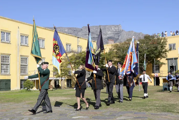 VO flag bearers march inside the Castle of Good Hope to celebrate VE Day.