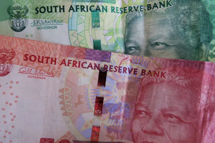 An image showing a South African 50 and 10 Rand note, Johannesburg, South Africa, 27 August 2015. Image, EPA, KIM LUDBROOK.