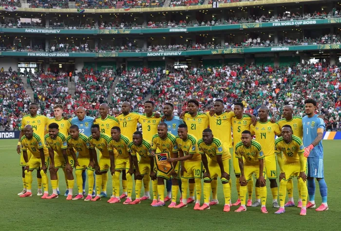 South Africa's forward #09 Lyle Foster hugs South Africa's forward #12 Thapelo Maseko while celebrating their team first goal during the 2026 World Cup Group A football match between South Africa and South Korea at the Monterrey Stadium in Guadalupe, Mexico, on June 24, 2026. Picture: Julio Cesar AGUILAR / AFP