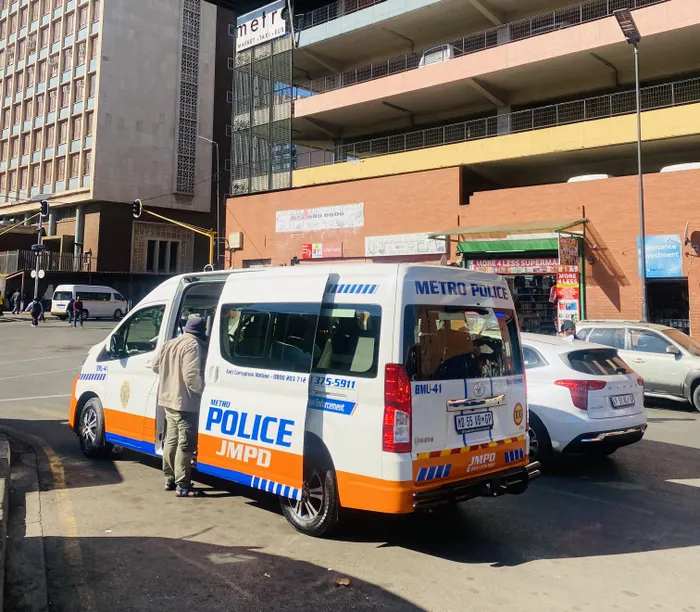 A Johannesburg Metropolitan Police Department vehicle patrols the Johannesburg CBD ahead of the planned June 30 protests.
