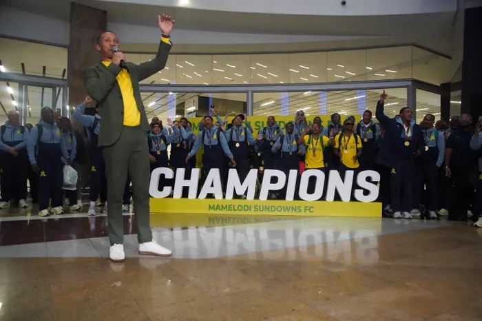 Mamelodi Sundowns arrived at OR Tambo International Airport late on Monday night to rapturous celebrations, after winning their second CAF Champions League title. Photo: Oupa Mokoena Independent Media