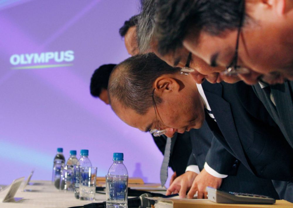 Olympus panel mulls criminal charges