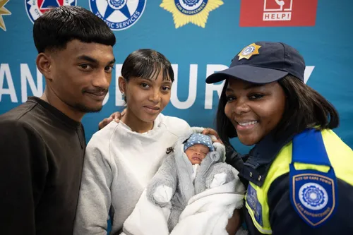 Hero City officer's heartwarming reunion with newborn
