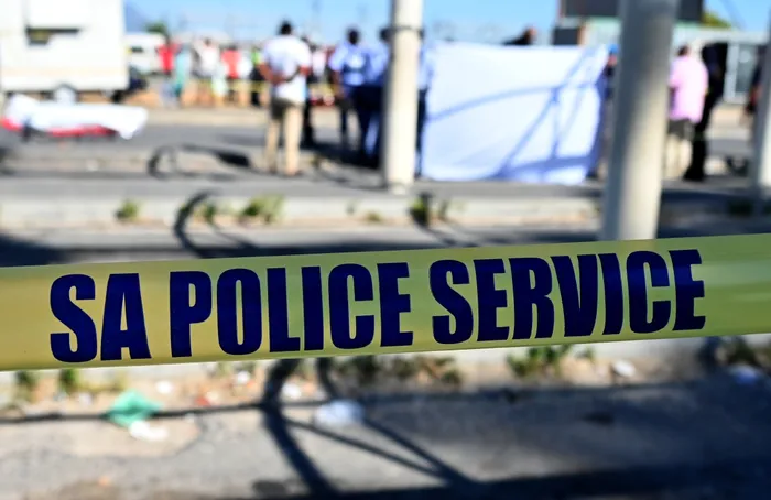 Two boys, 16 and 18, were shot dead in a suspected gang-related drive-by shooting.