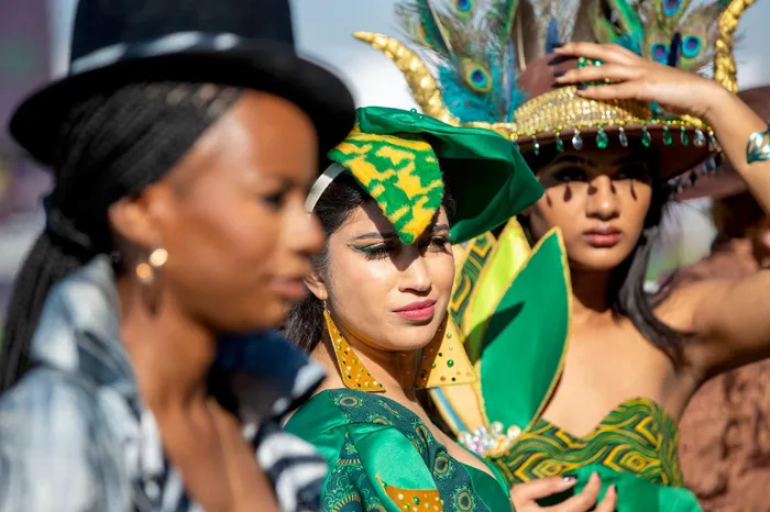 Luxurious fabrics and olive greens were spotted at Hollywoodbets Durban July 2026.