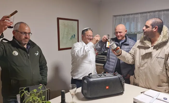 Israel's Security Minister Itamar Ben-Gvir celebrating the conversion of a Palestinian area into an Israeli settlement.