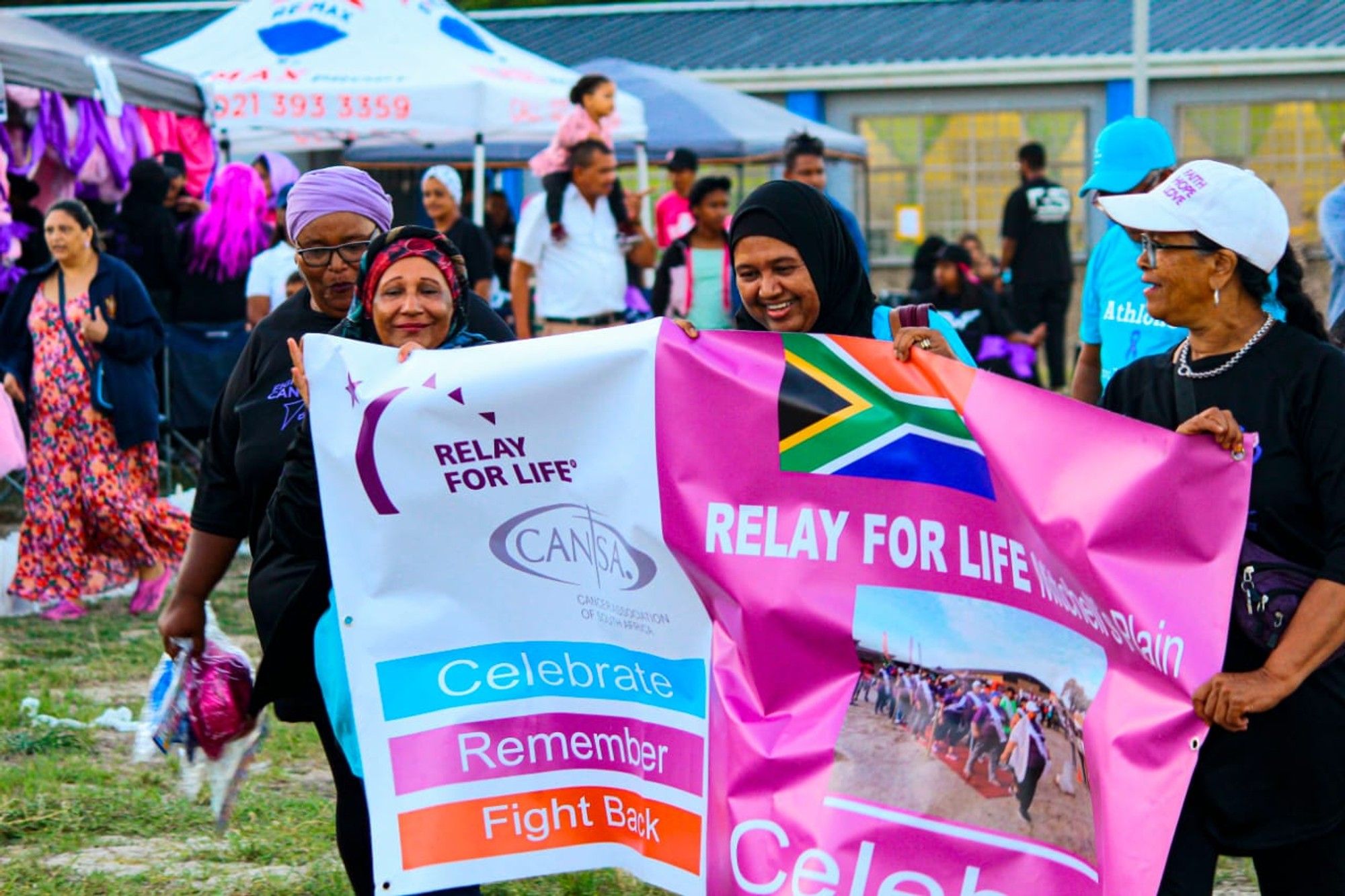 Cancer survivors take to tracks in relay for life