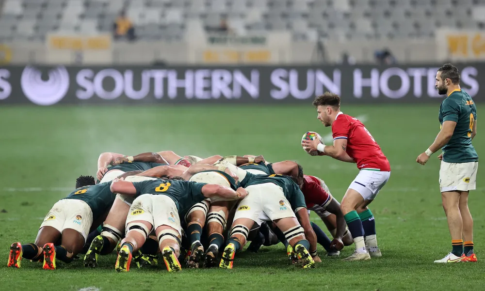 British and Irish Lions' scrum-half Ali Price puts the ball into the scrum during the third Test against the Springboks at Cape Town Stadium in Cape Town on Saturday