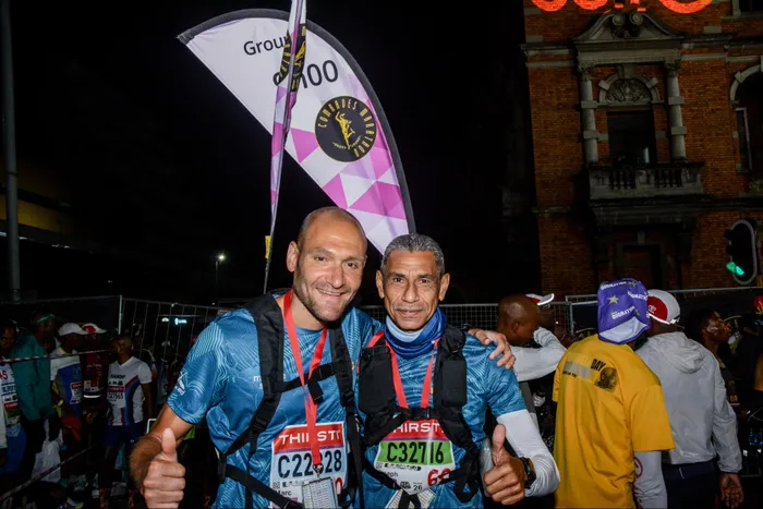 Two of the official 2026 Comrades Marathon Pacesetters, Marc Gispert Giron (sub-7:30) and Joe Faber (sub-9:00).