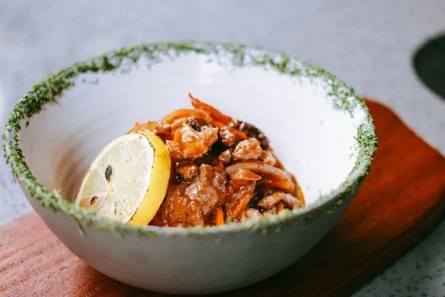 Savour the soulful comfort of our Sardine Pap Bowl, where soft phutu pap meets a fragrant tomato and sardine relish, creating a dish that feels like home