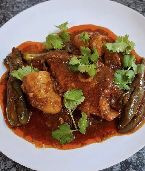 Tangy Salmon, fish roe and brinjal curry