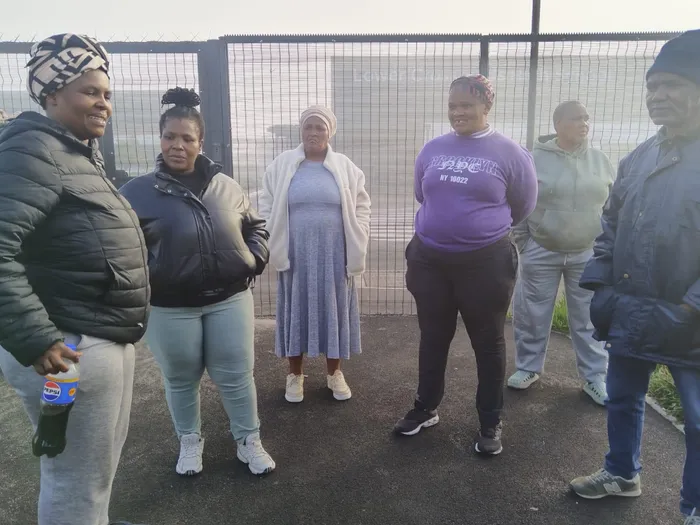 Parents stood firm at the Lower Crossroads High School gate.