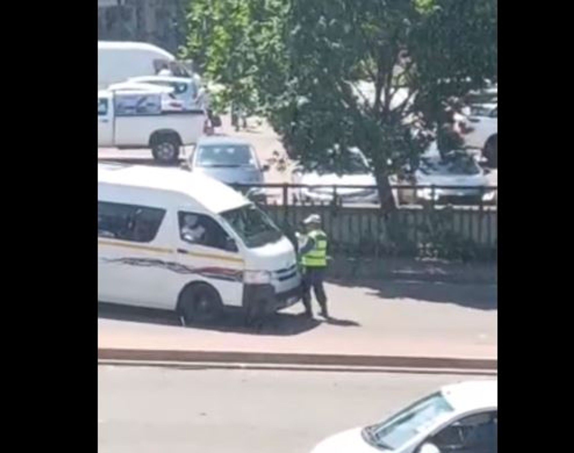 Taxi driver filmed trying to run over a Durban Metro cop issuing him a ...