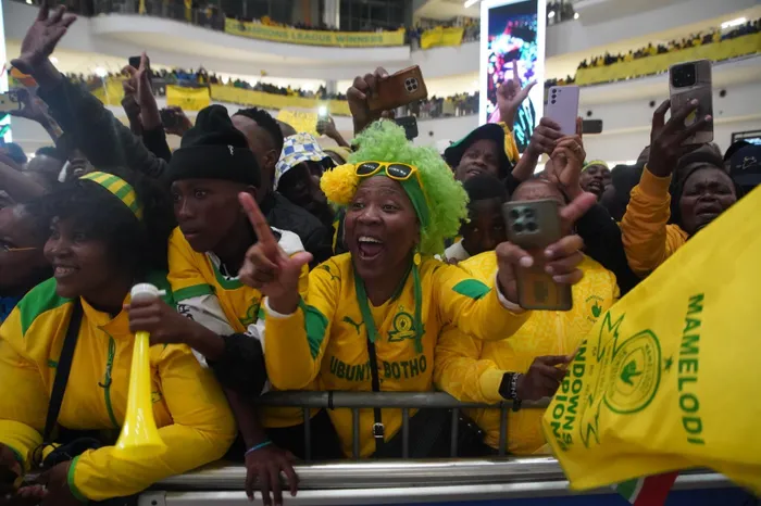 Mamelodi Sundowns arrived at OR Tambo International Airport late on Monday night to rapturous celebrations, after winning their second CAF Champions League title. Photo: Oupa Mokoena Independent Media