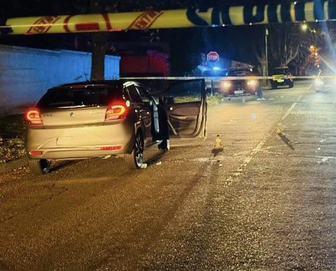 Police officers secure the area in Houghton following the shooting of suspended Major-General Feroz Khan.
