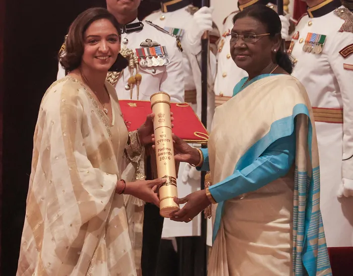 President Droupadi Murmu confers the Padma Shri on Indian women's cricket team captain Harmanpreet Kaur during the Civil Investiture Ceremony. 