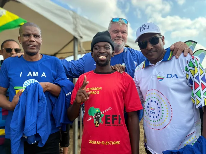 DA provincial leader Sithembiso Ngema, the party's Durban North constituency head, Tim Brauteseth, and the party's eThekwini Municipality mayoral candidate Haniff Hoosen welcome new members.