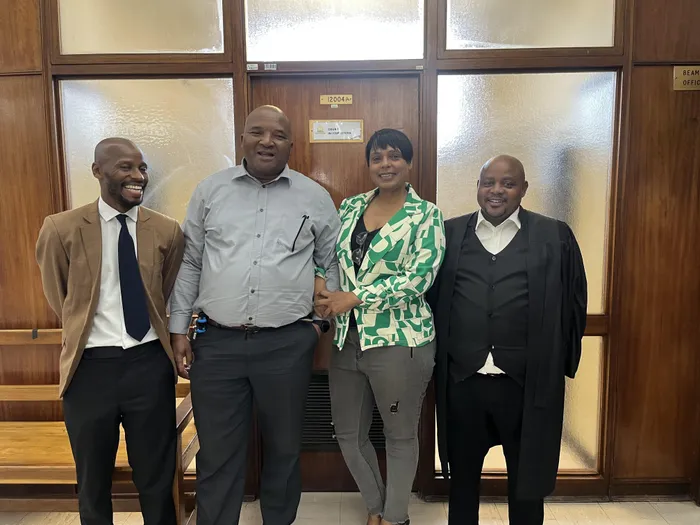 Outside the court, Faith Ogle expressed her gratitude to the police and the prosecution for getting her husband justice. From left, Captain Majola from the Metro Police Tracing Unit, Hawks warrant officer Sibusiso Ntshangase, Faith, and senior advocate Bonginkosi Mbokazi. 