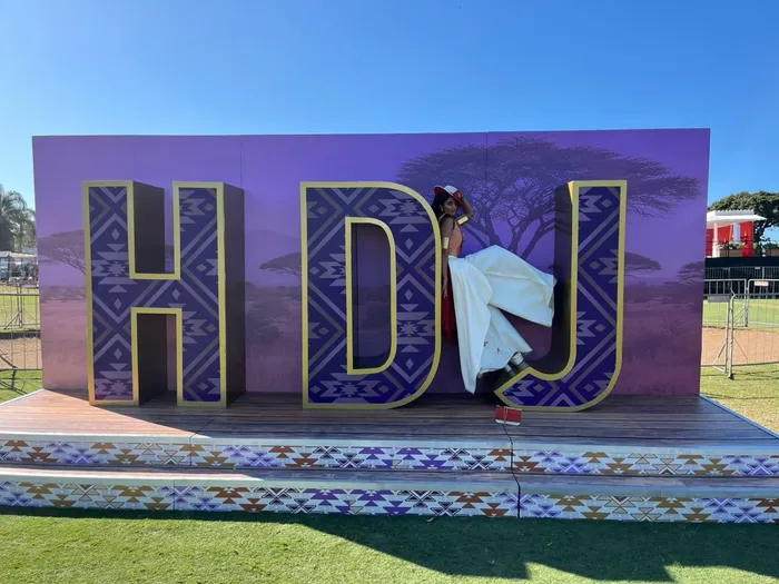 Juraysa Athiah a model from  Pietermaritzburg wears a design from Mbali at the 2026 Hollywoodbets Durban July.