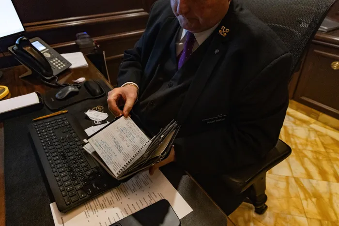 One of Watson’s secret weapons: a notebook of contacts throughout DC. 